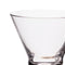 Clear glass cocktail glass on a white background