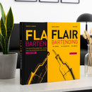 Books titled 'Flair Bartending' by Marco Canova on a surface with decorative elements.