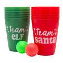 Green and red cups labeled 'Team Elf' and 'Team Santa' with two small balls on a white background.