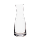 Clear glass carafe on a white background