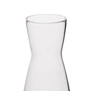 Clear glass carafe on a white background