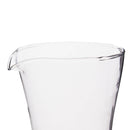 Clear glass pitcher on a white background