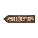 Wooden arrow-shaped sign with 'Bat Boulevard' text and bat designs on a white background