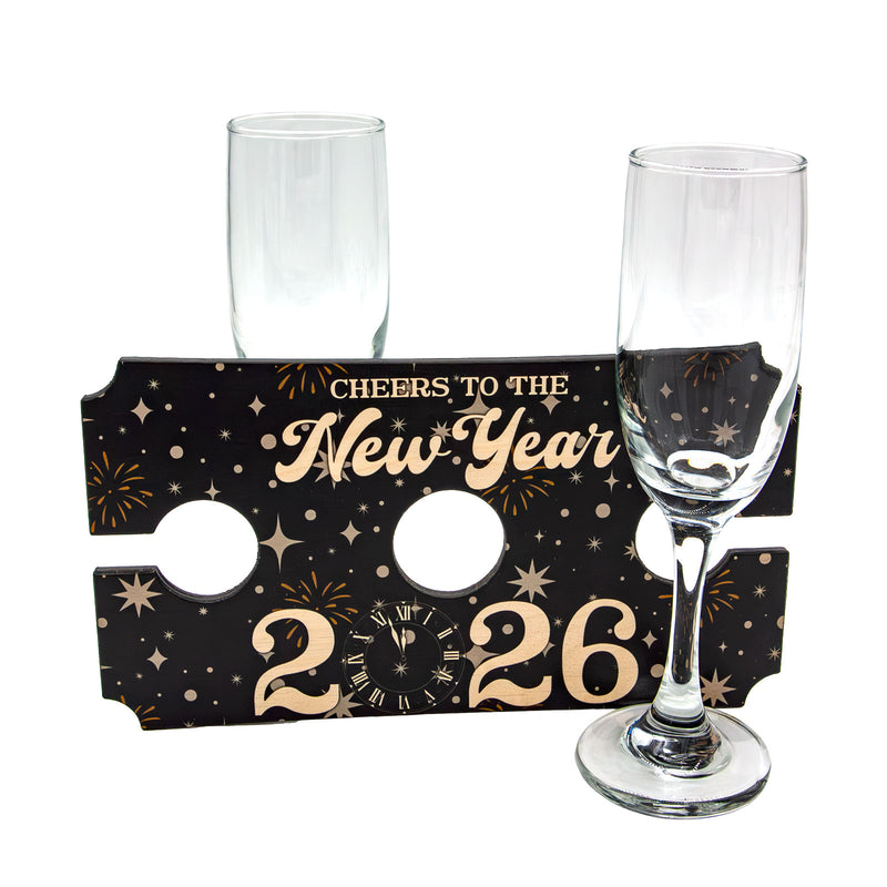 Two champagne flutes with a 'Cheers to the New Year 2026' holder on a white background