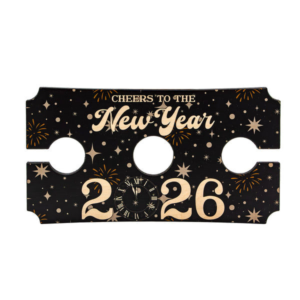 New Year's eve wine glass caddy with 'Cheers to the New Year 2026' text on a black background
