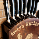 Set of knives in a wooden block with 'Avery's Kitchen' branding.