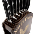 Set of knives in a wooden block with 'Avery's Kitchen' branding on a white background