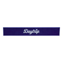 Blue bar mat with 'Daytrip' logo on a white background