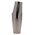 A polished silver metal cocktail shaker with a textured, diamond-patterned grip, shown stacked on a solid white background.