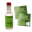 Miniature bottle of alcohol with personalized labels on a white background