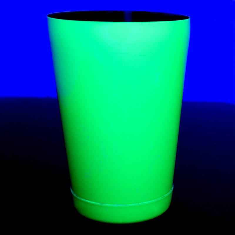 neon yellow 18 ounce shaker glows under a black light