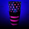 Neon pink flag shaker design glows under a black light