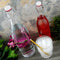 Round Glass Bottle w/ Swing Top - Available in 1 Liter or 17 ounce